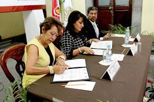 Firman convenio de colaboración el TSJE y la FECIC